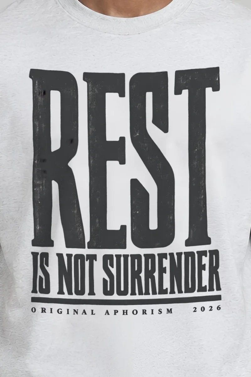"Rest Is Not Surrender" Heavyweight Unisex Crewneck T-shirt - the graphic up close