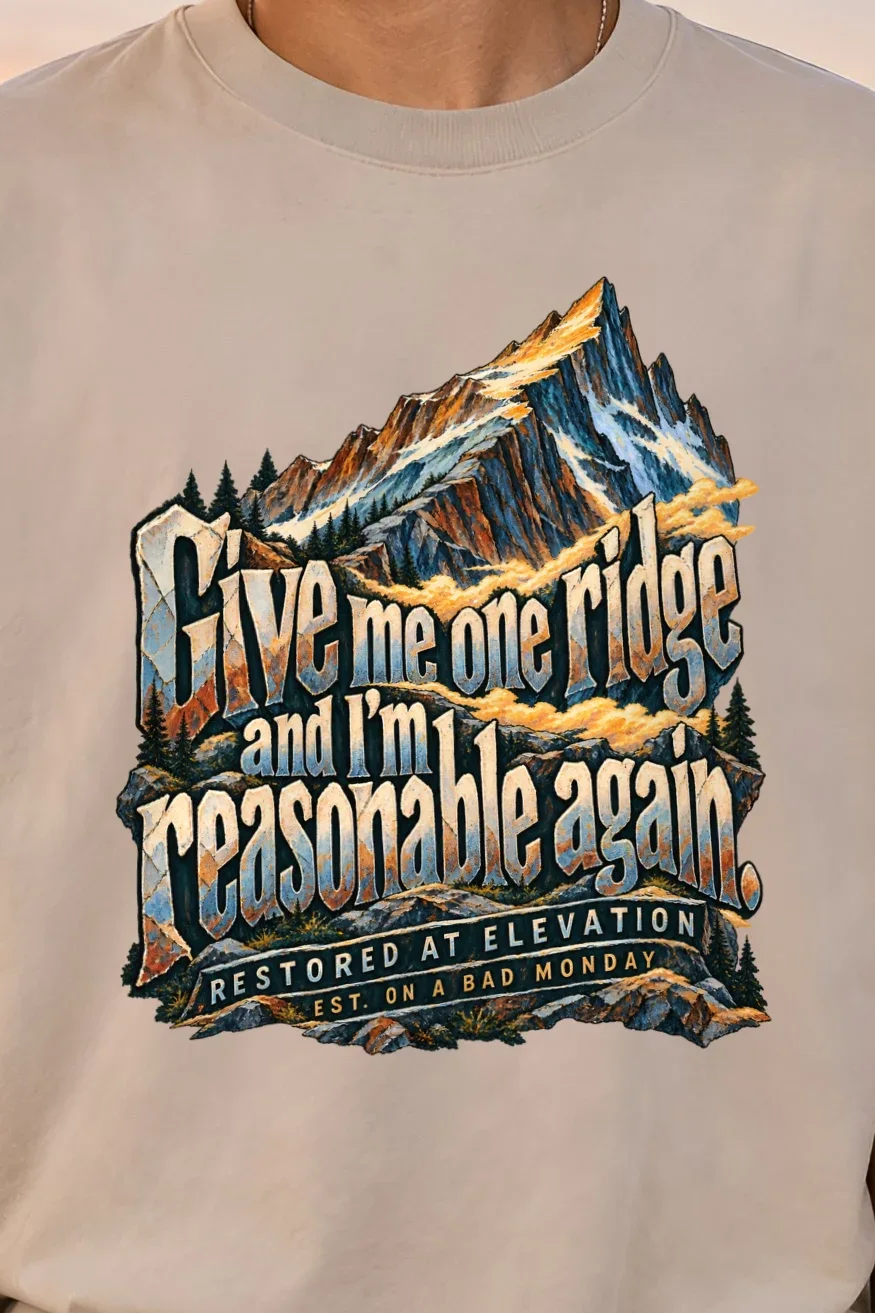 "Restored At Elevation" Unisex Oversized Heavyweight Crewneck T-Shirt - the graphic up close