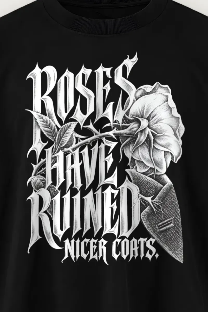 "Roses Have Ruined Nicer Coats" Men’s Oversized Heavyweight Crewneck T-Shirt - the graphic up close