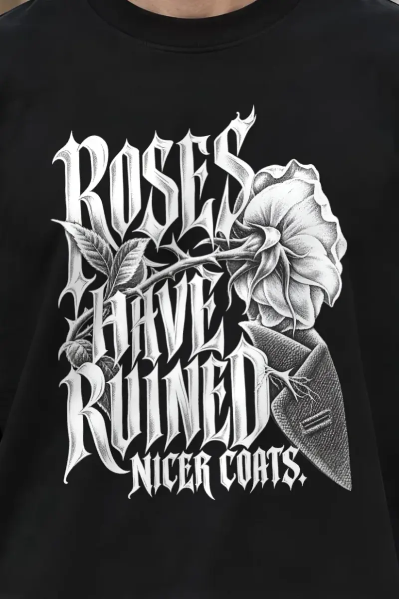 "Roses Have Ruined Nicer Coats" Men’s Oversized Heavyweight Crewneck T-Shirt - the graphic up close