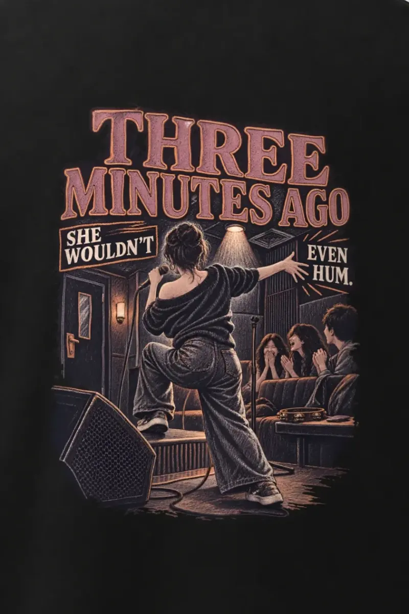 "She Wouldn’t Even Hum" Men’s Oversized Heavyweight Crewneck T-Shirt - the graphic up close