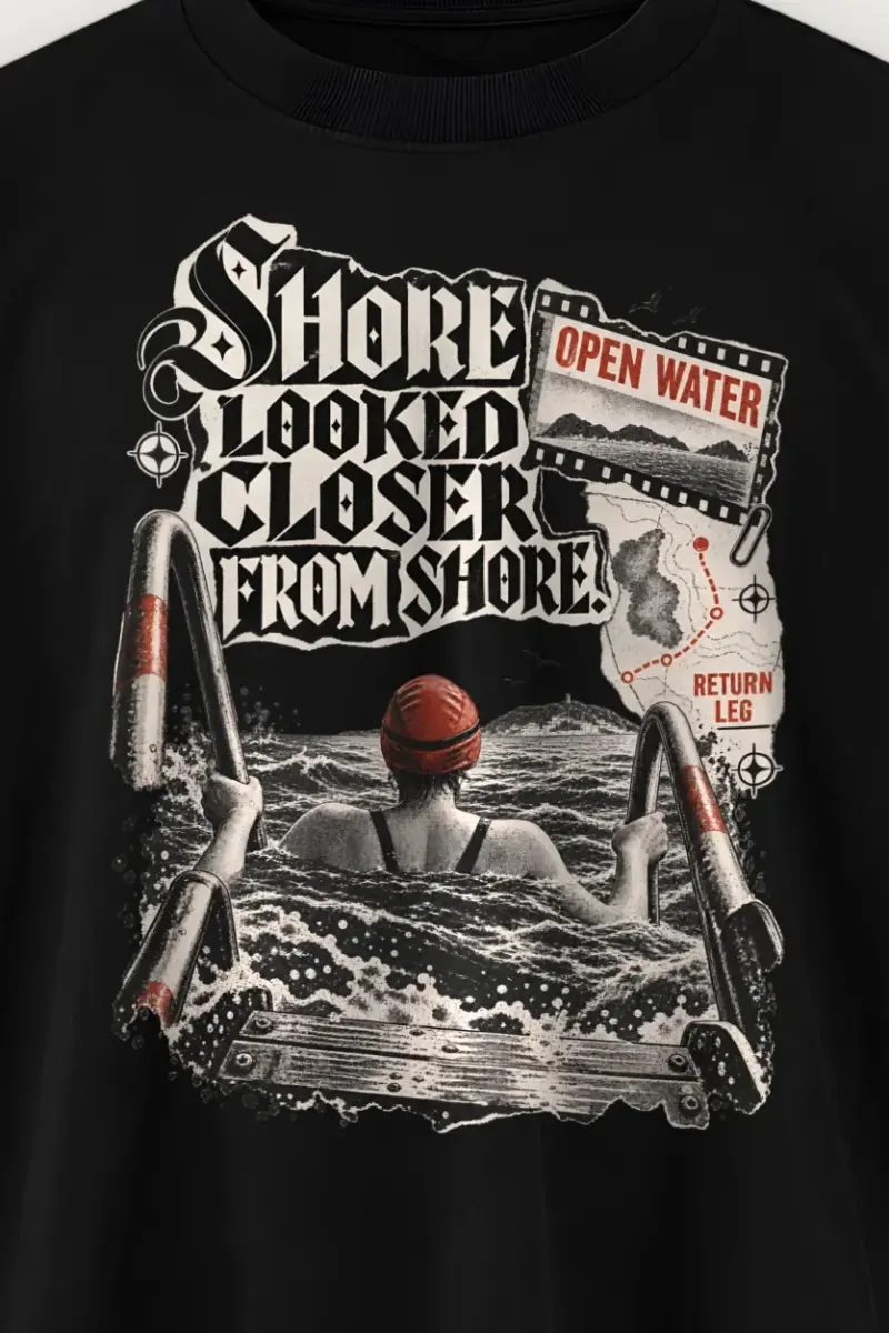 "Shore Looked Closer From Shore" Men’s Oversized Heavyweight Crewneck T-Shirt - the graphic up close