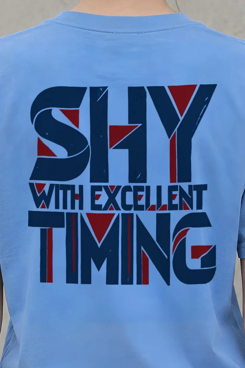 "Shy With Excellent Timing" Heavyweight Unisex Crewneck T-shirt - the graphic up close