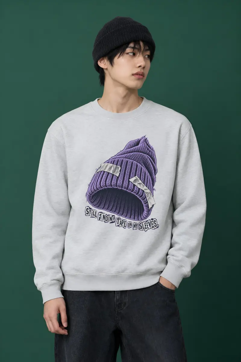 "Still Finding Tape On My Sleeves." Heavy Blend Unisex Crewneck Sweatshirt