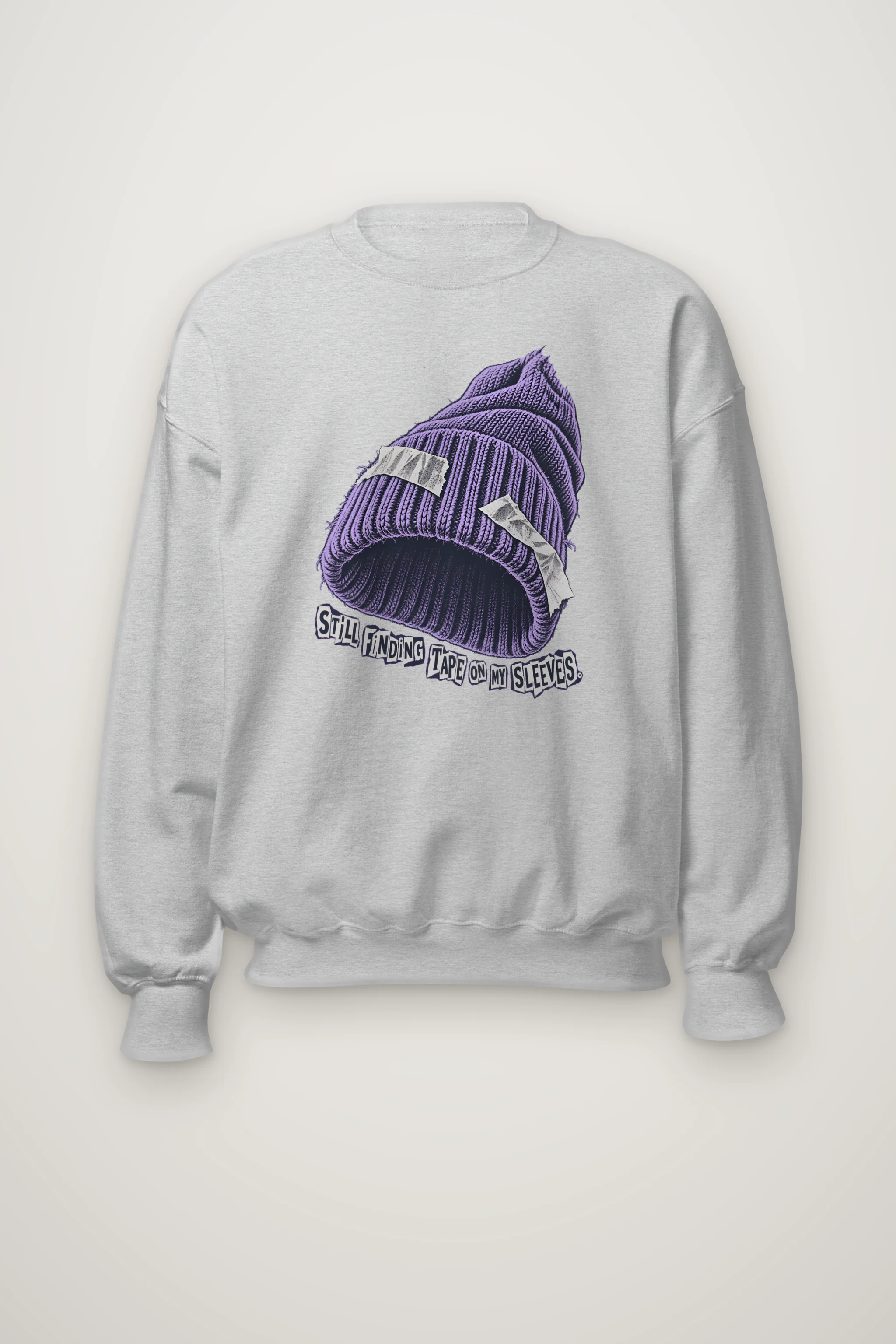 "Still Finding Tape On My Sleeves." Heavy Blend Unisex Crewneck Sweatshirt