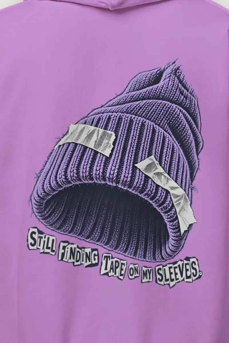 "Still Finding Tape On My Sleeves" Heavy Blend Unisex Pullover Hoodie - the graphic up close
