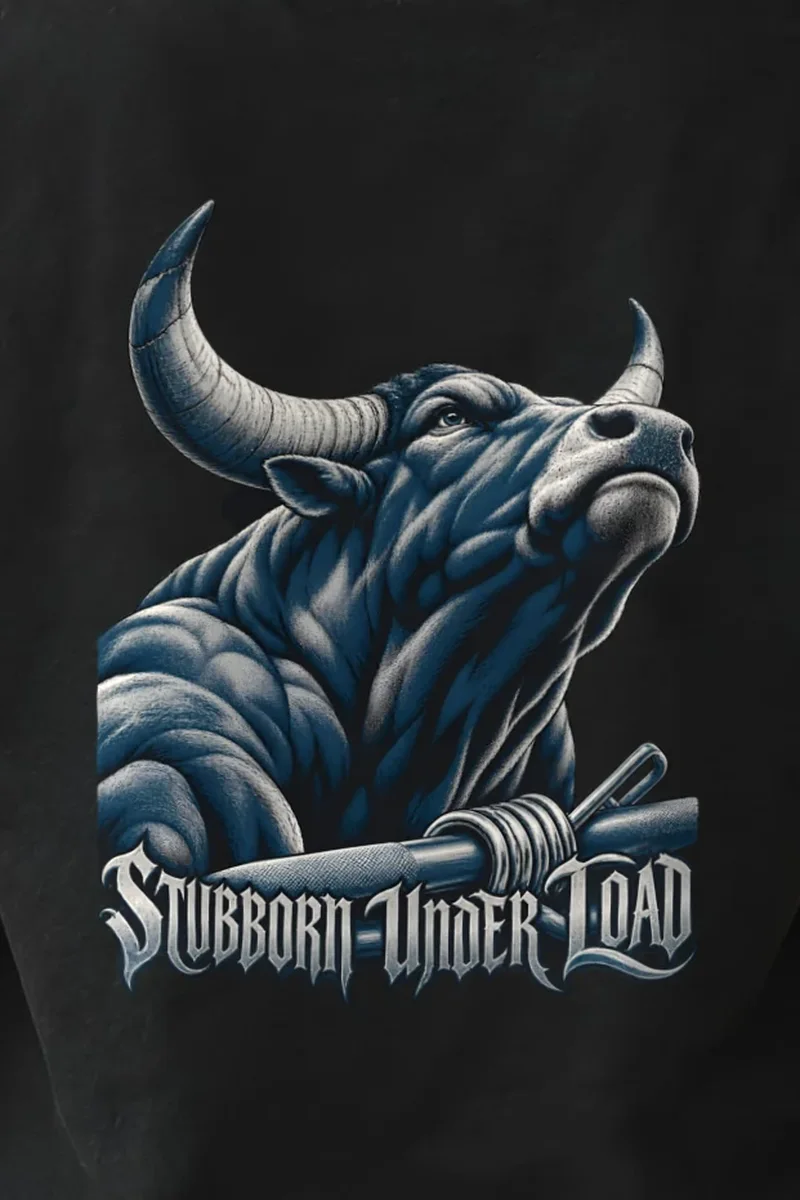 "Stubborn Under Load" Heavyweight Unisex Crewneck T-shirt - the graphic up close