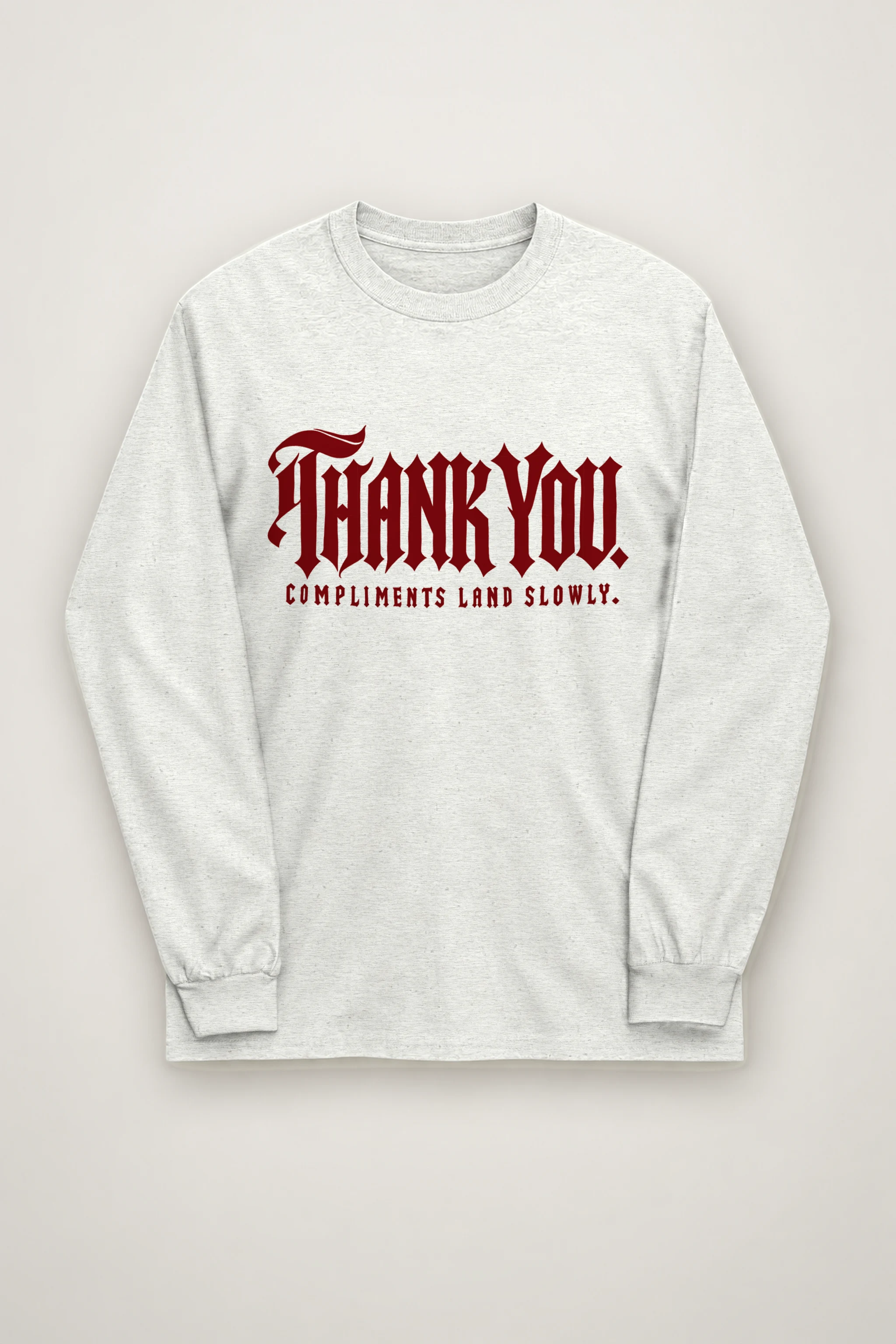 "Thank You. Compliments Land Slowly." Unisex Longsleeve T-shirt