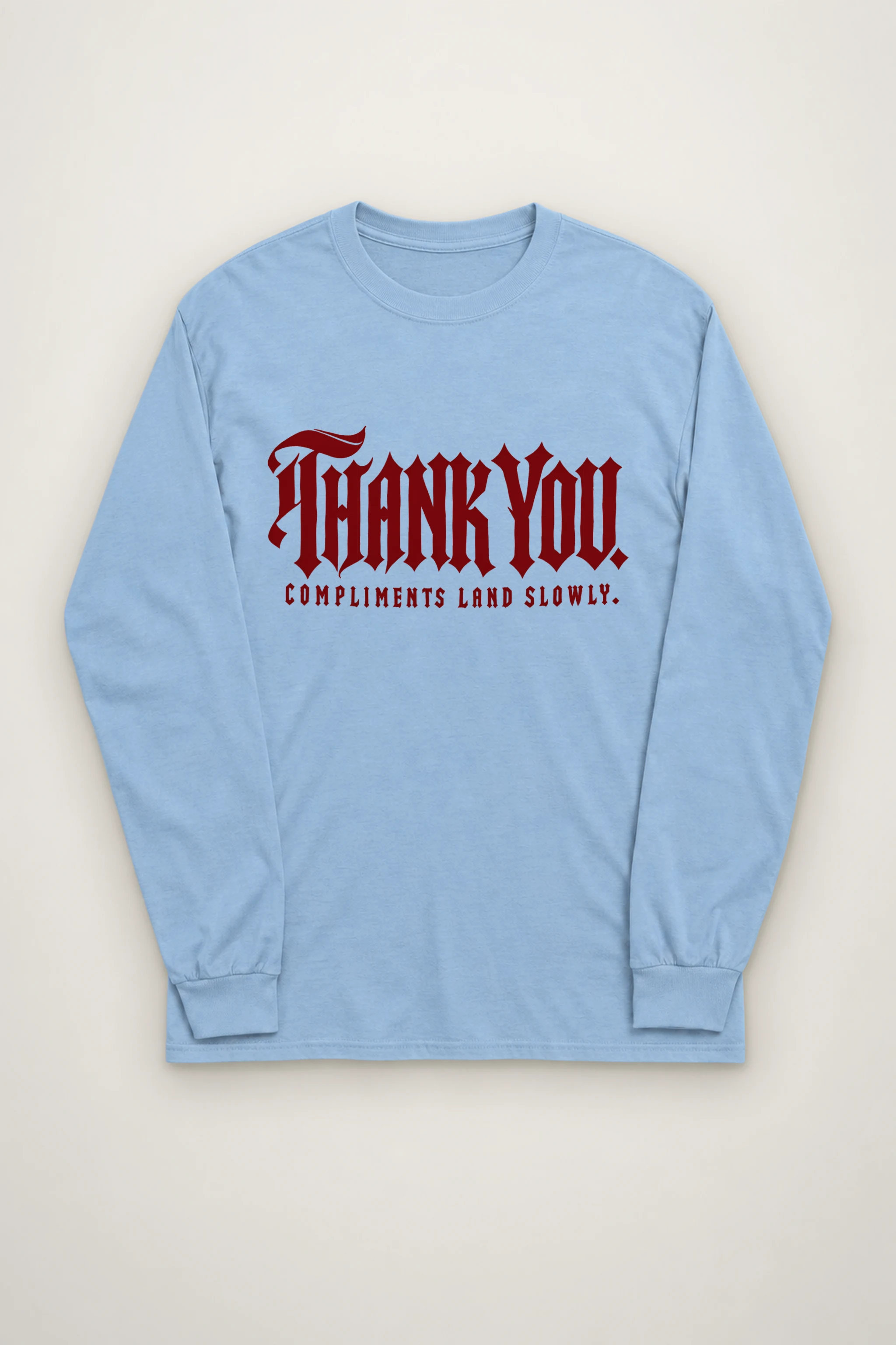 "Thank You. Compliments Land Slowly." Unisex Longsleeve T-shirt