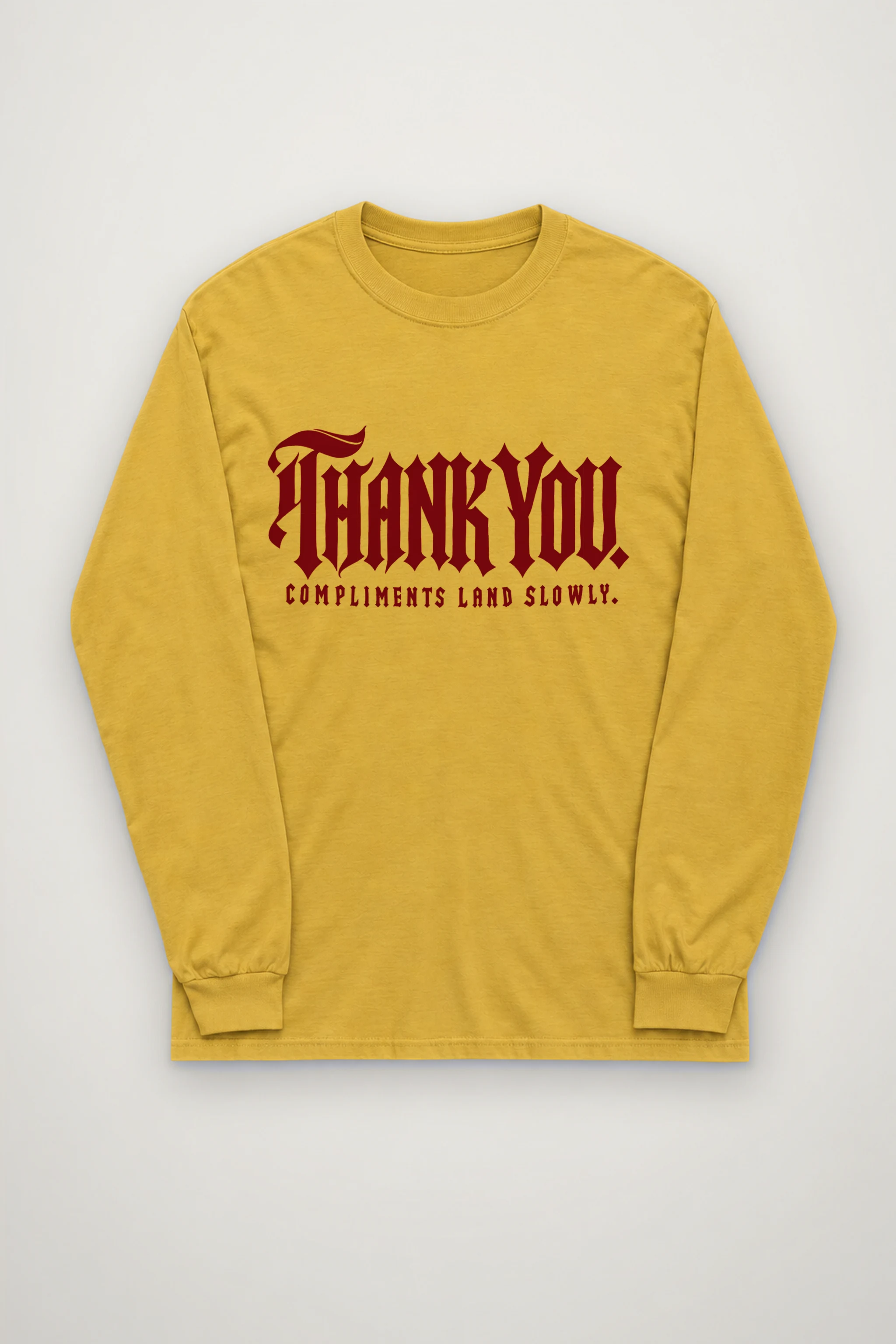 "Thank You. Compliments Land Slowly." Unisex Longsleeve T-shirt
