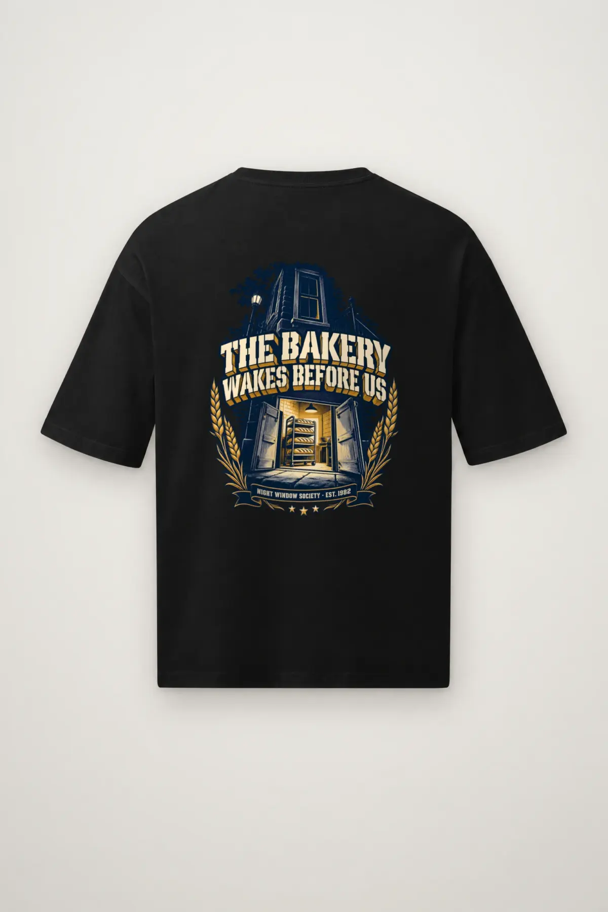 "THE BAKERY WAKES BEFORE US NIGHT WINDOW SOCIETY . EST. 1982" Men's Oversized Heavyweight Crewneck T-Shirt
