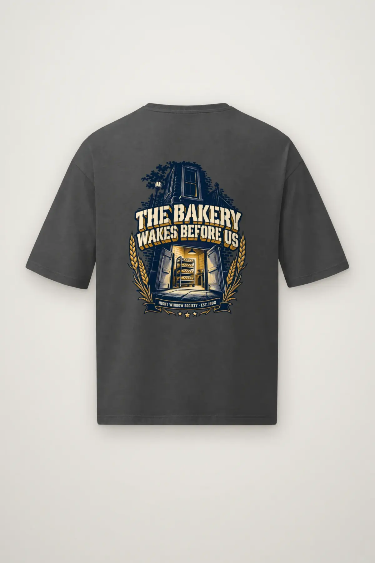 "THE BAKERY WAKES BEFORE US NIGHT WINDOW SOCIETY . EST. 1982" Men's Oversized Heavyweight Crewneck T-Shirt