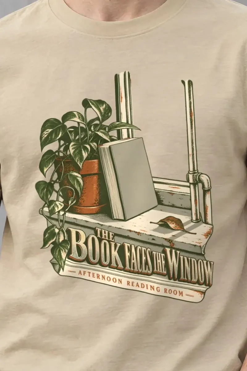 "The Book Faces the Window" Heavyweight Unisex Crewneck T-shirt - the graphic up close