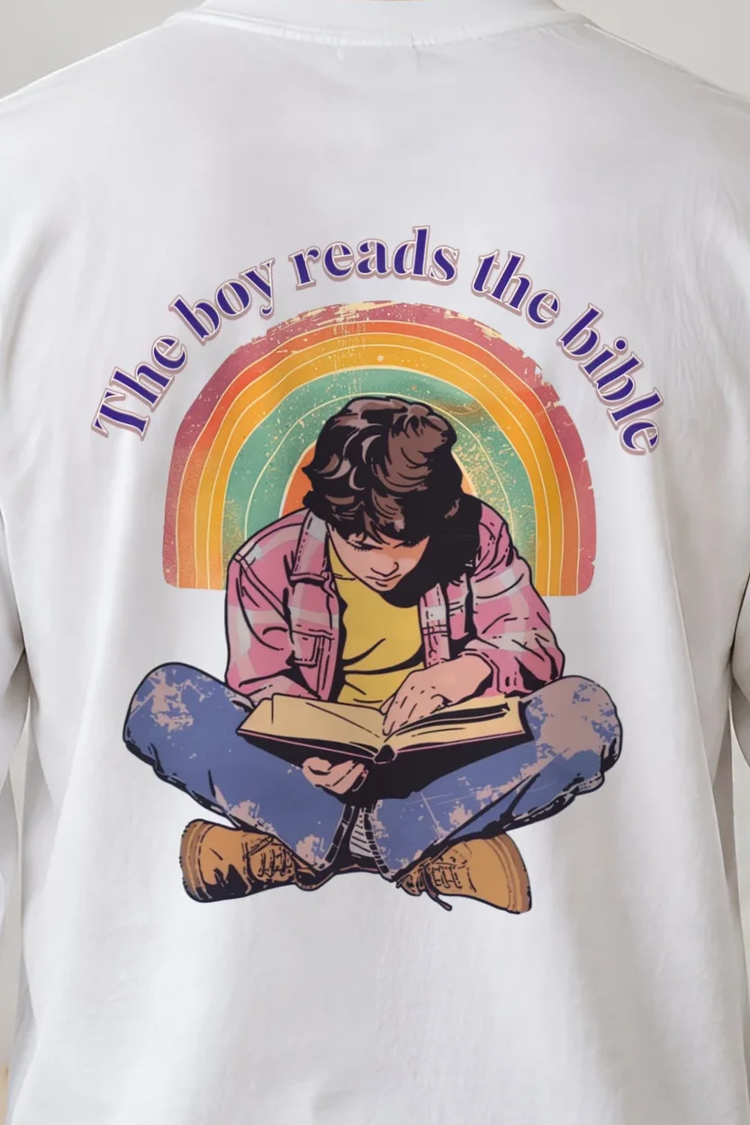 "The Boy Reads The Bible" Unisex Longsleeve T-shirt - the graphic up close
