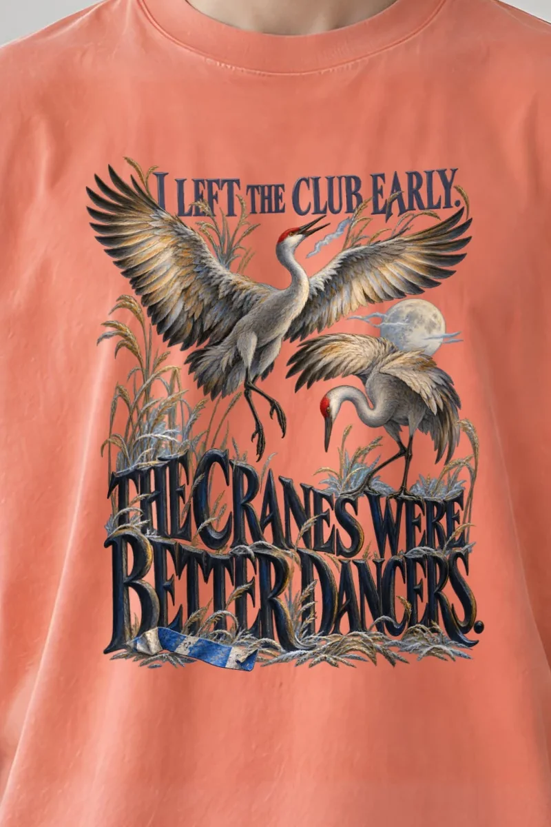 "The Cranes Were Better Dancers" Unisex Oversized Heavyweight Crewneck T-Shirt - the graphic up close