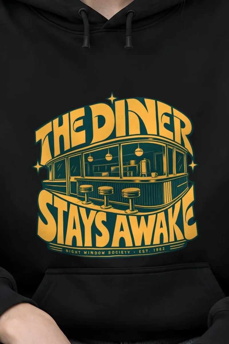 "The Diner Stays Awake" Heavy Blend Unisex Pullover Hoodie - the graphic up close