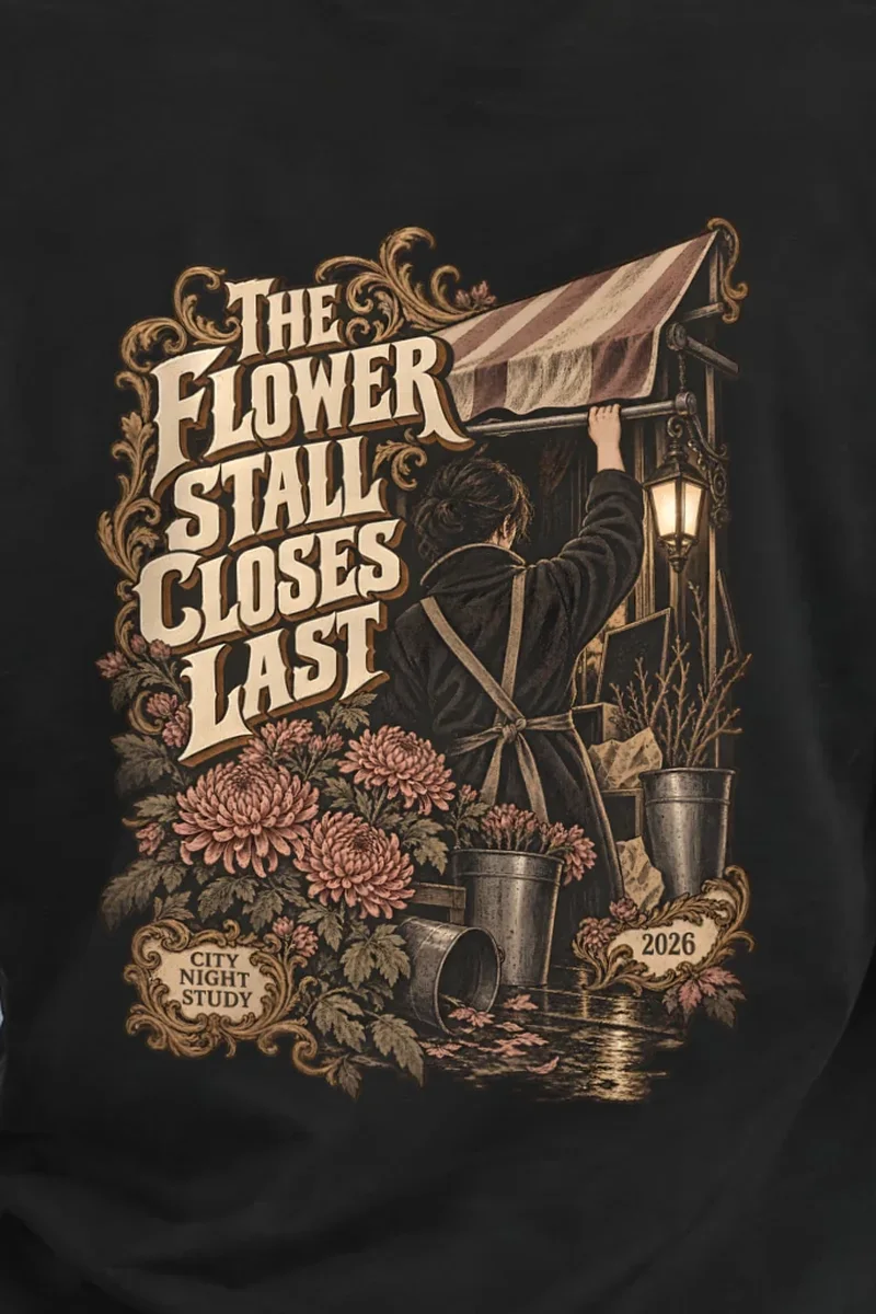 "THE FLOWER STALL CLOSES LAST" Heavyweight Unisex Crewneck T-shirt - the graphic up close