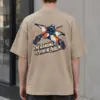 "The Landing Is a Future Me Problem" Men's Oversized Heavyweight Crewneck T-Shirt