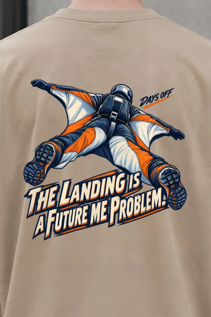 "The Landing Is a Future Me Problem" Men’s Oversized Heavyweight Crewneck T-Shirt - the graphic up close