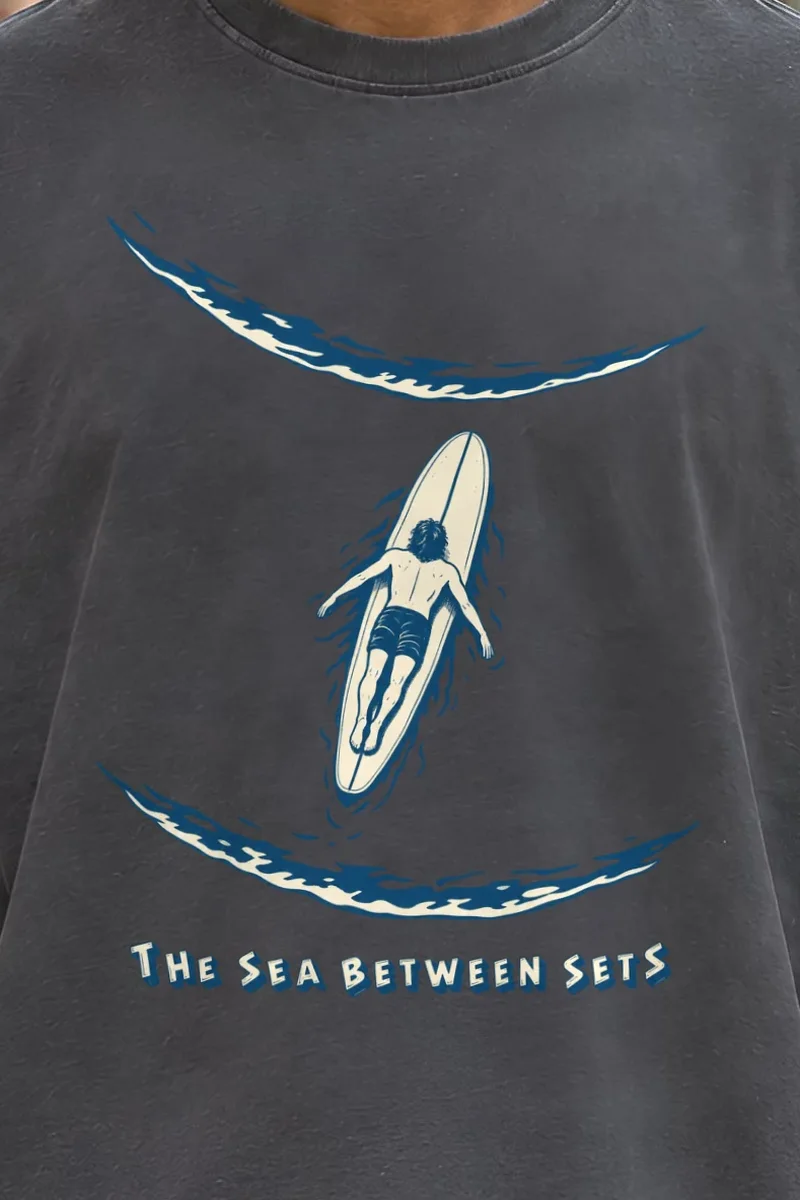 "The Sea Between Sets" Men’s Oversized Heavyweight Crewneck T-Shirt - the graphic up close