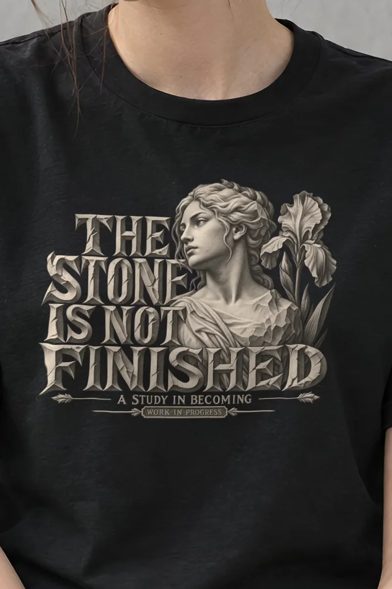 "THE STONE IS NOT FINISHED" Heavyweight Unisex Crewneck T-shirt - the graphic up close