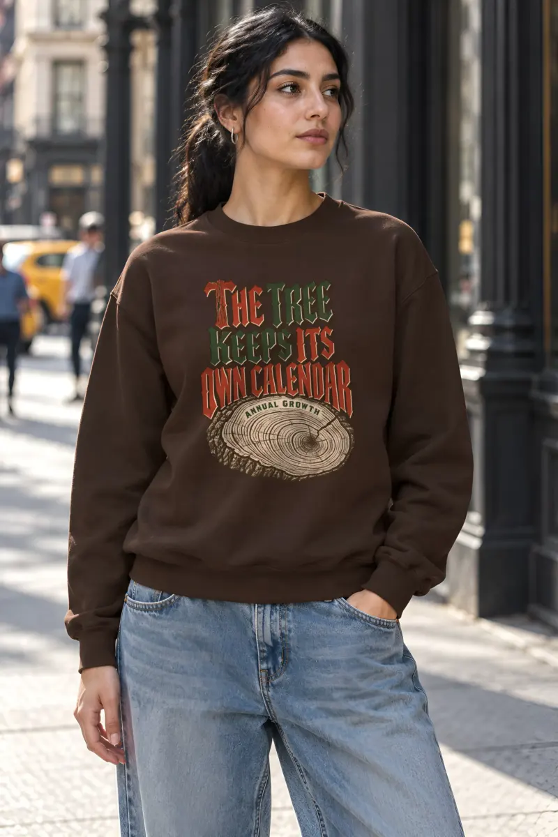 "The Tree Keeps Its Own Calendar" Heavy Blend Unisex Crewneck Sweatshirt