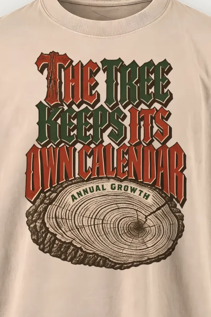 "The Tree Keeps Its Own Calendar" Men’s Oversized Heavyweight Crewneck T-Shirt - the graphic up close