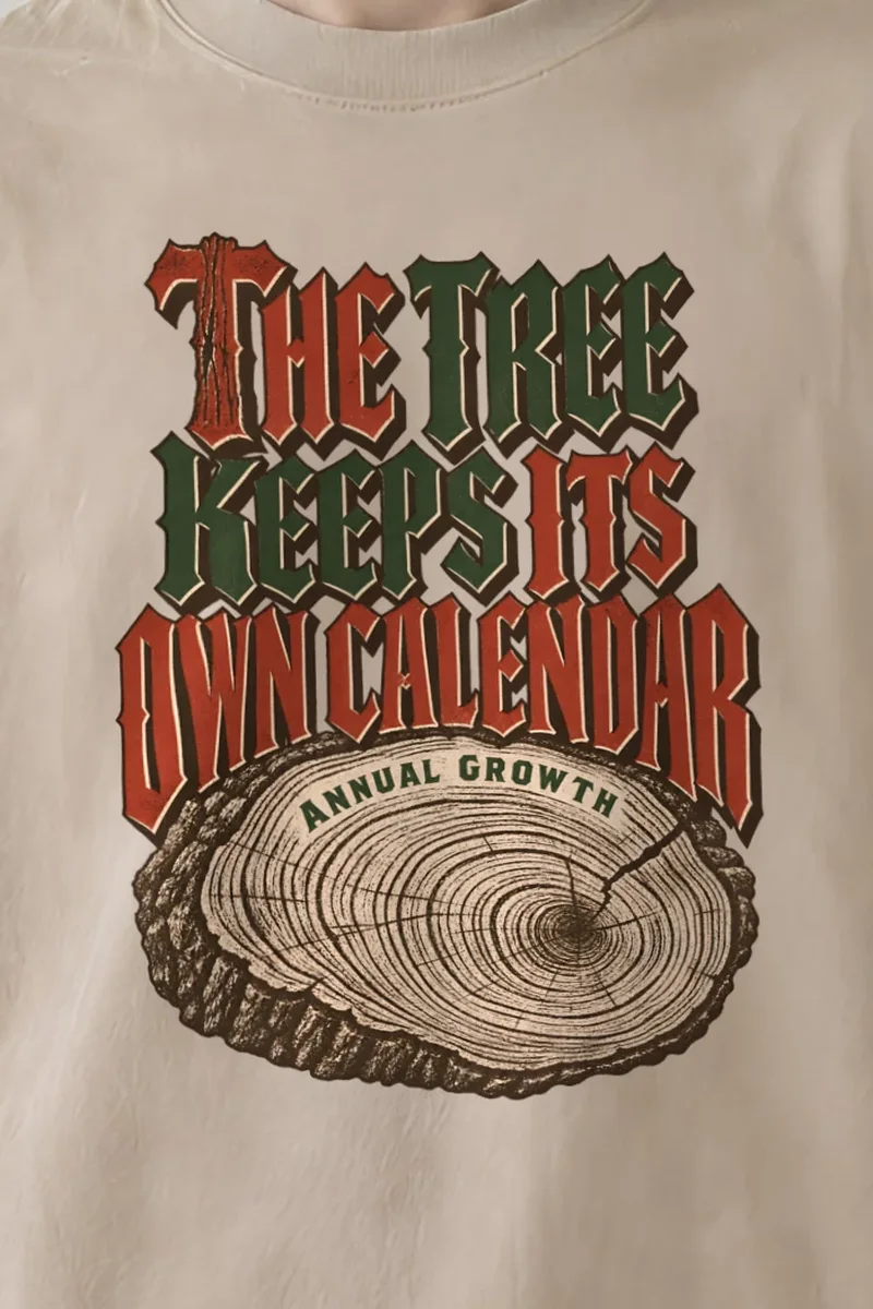 "The Tree Keeps Its Own Calendar" Men’s Oversized Heavyweight Crewneck T-Shirt - the graphic up close