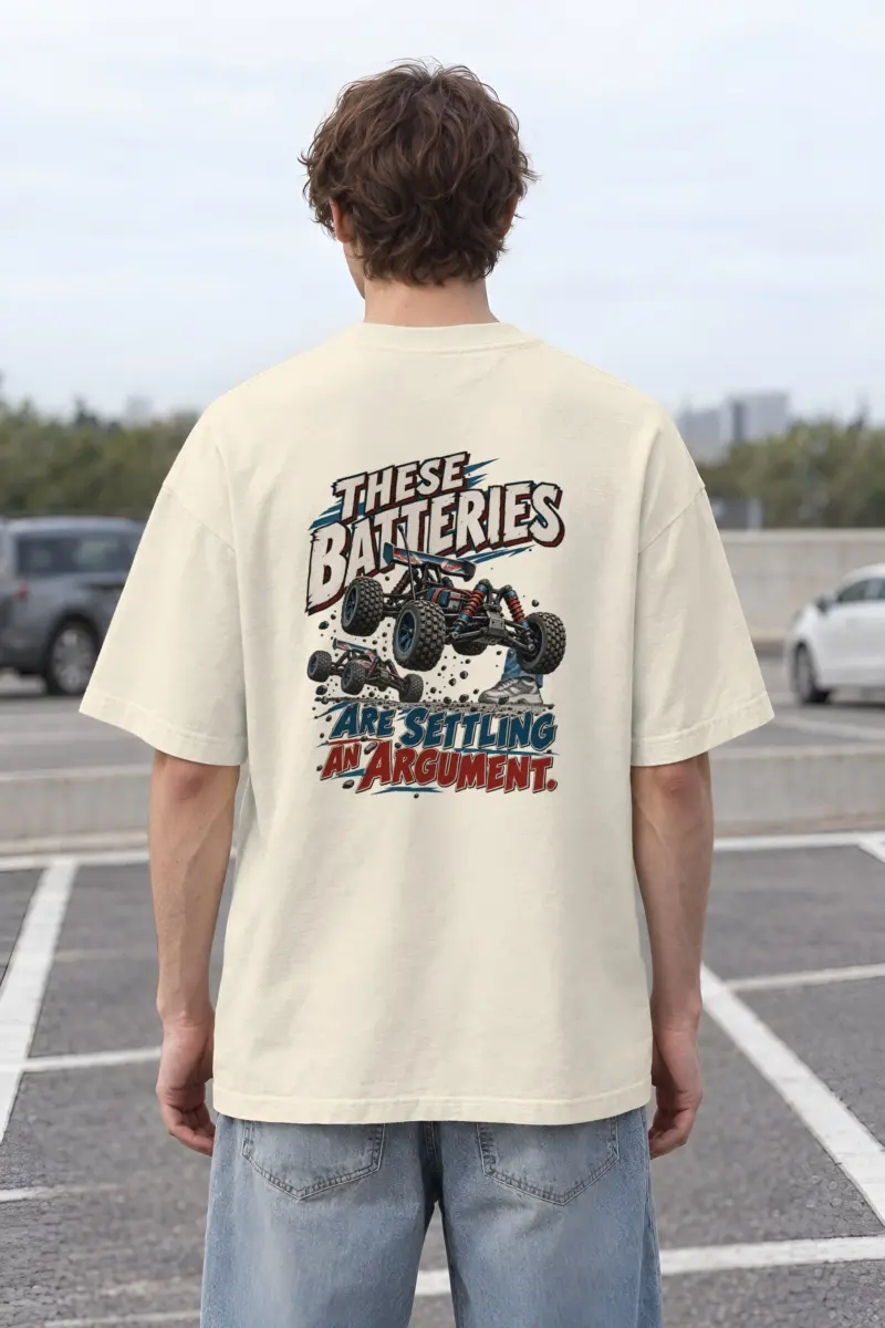“These Batteries Are Settling an Argument” Men’s Oversized Heavyweight Crewneck T-Shirt