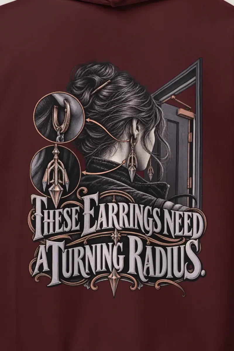 "These Earrings Need A Turning Radius" Heavy Blend Unisex Pullover Hoodie - the graphic up close