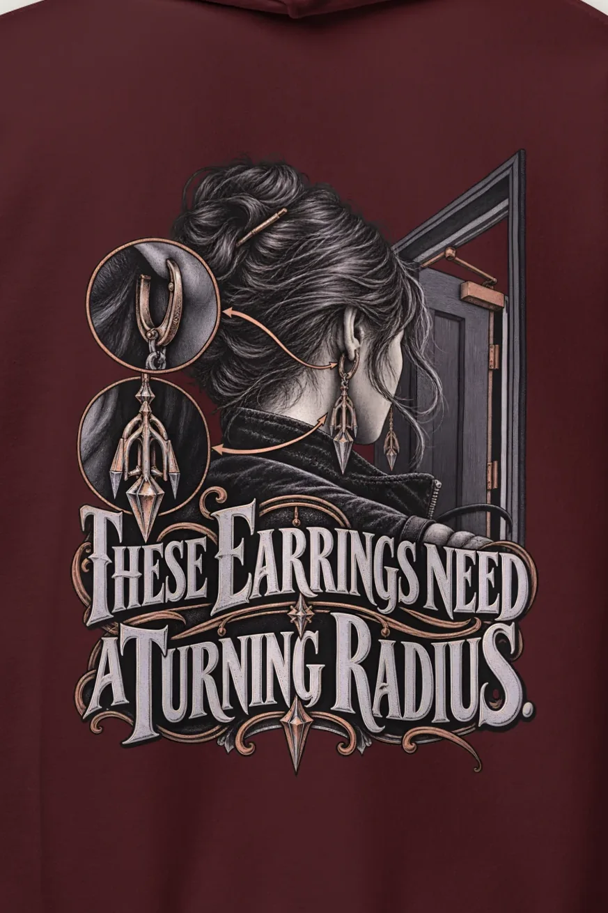 "These Earrings Need A Turning Radius" Heavy Blend Unisex Pullover Hoodie - the graphic up close