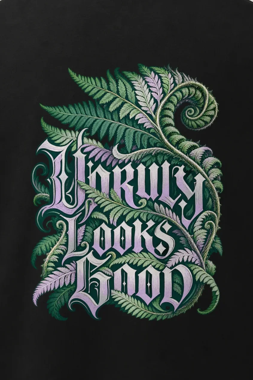 "Unruly Looks Good" Men’s Oversized Heavyweight Crewneck T-Shirt - the graphic up close
