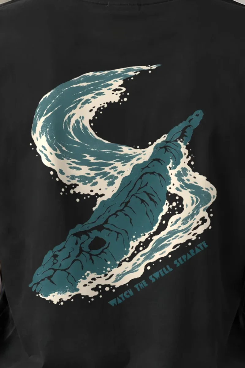 "Watch the Swell Separate" Unisex Longsleeve T-shirt - the graphic up close