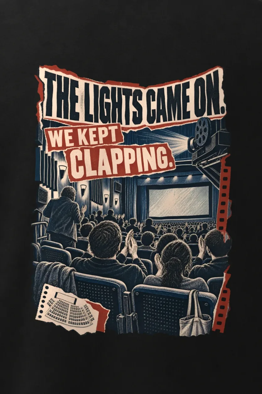 "We Kept Clapping" Men’s Oversized Heavyweight Crewneck T-Shirt - the graphic up close