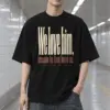 "We Love Him, Because He First Loved Us." Men's Oversized Heavyweight Crewneck T-Shirt