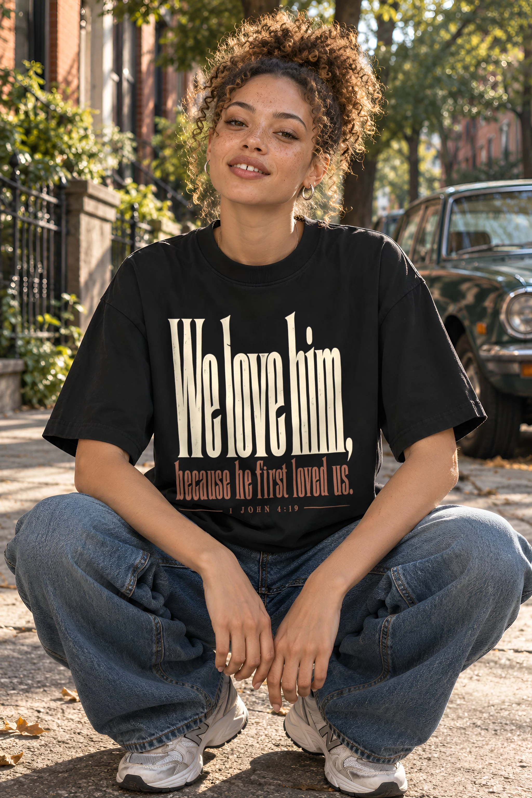 "We Love Him, Because He First Loved Us." Unisex Oversized Heavyweight Crewneck T-Shirt