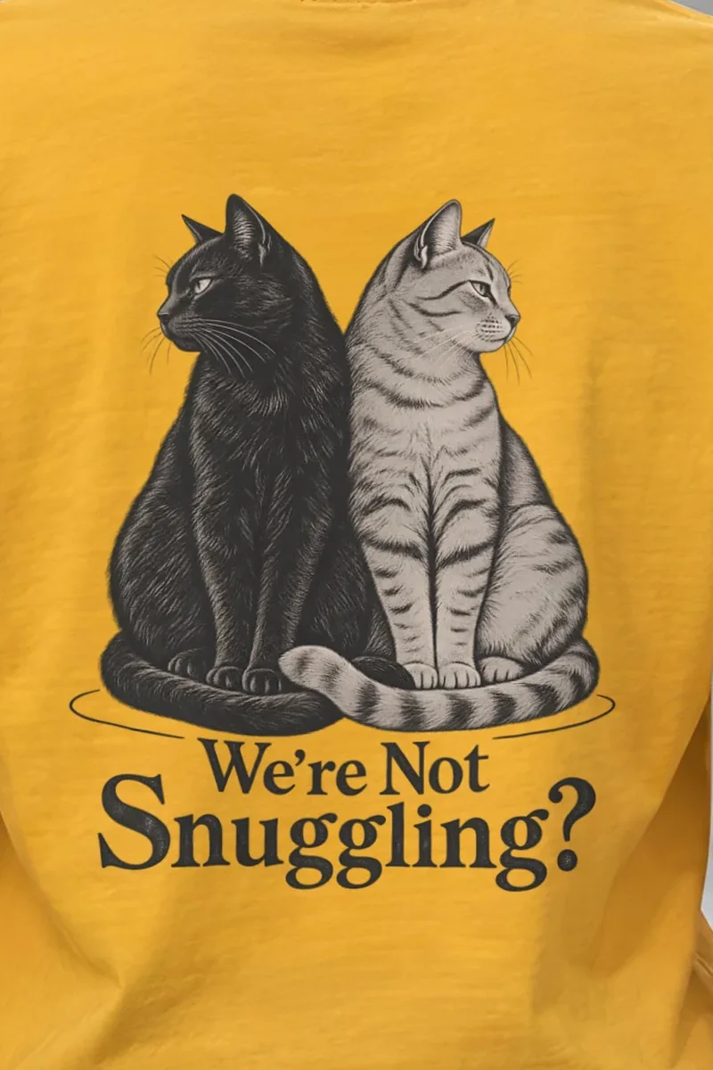 "We’re Not Snuggling?" Heavyweight Unisex Crewneck T-shirt - the graphic up close