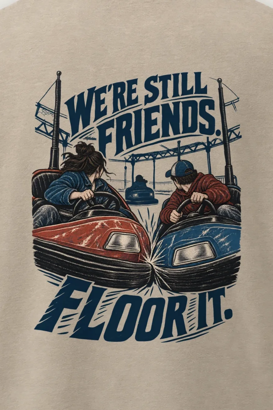 "We’re Still Friends. Floor It." Men’s Oversized Heavyweight Crewneck T-Shirt - the graphic up close