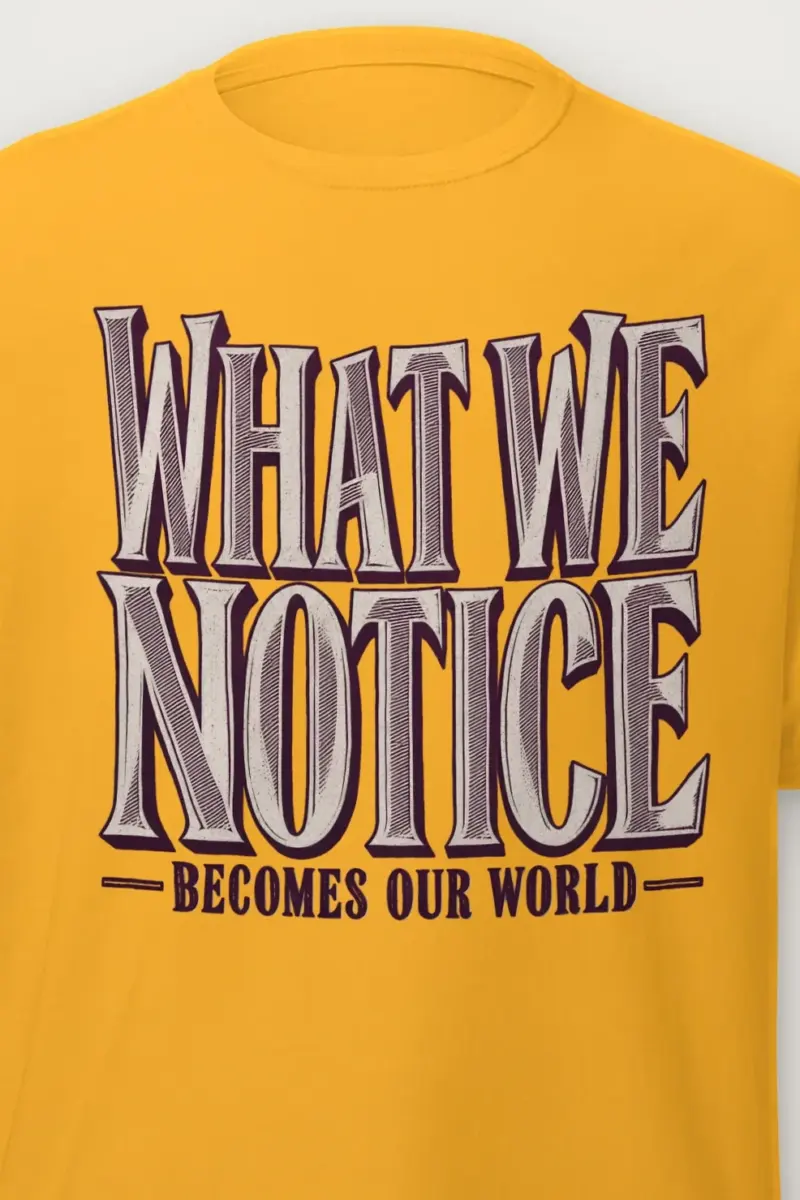 "WHAT WE NOTICE BECOMES OUR WORLD" Heavyweight Unisex Crewneck T-shirt - the graphic up close