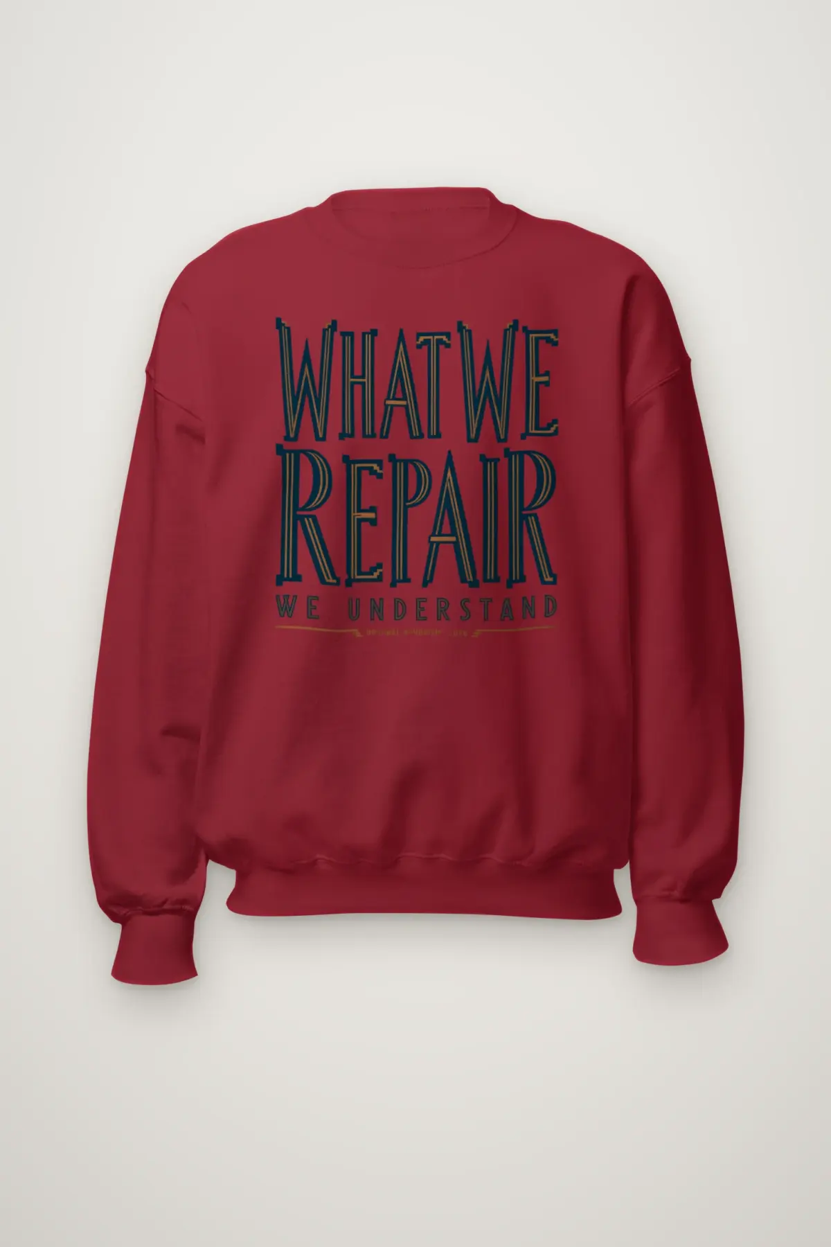 "What We Repair We Understand" Heavy Blend Unisex Crewneck Sweatshirt