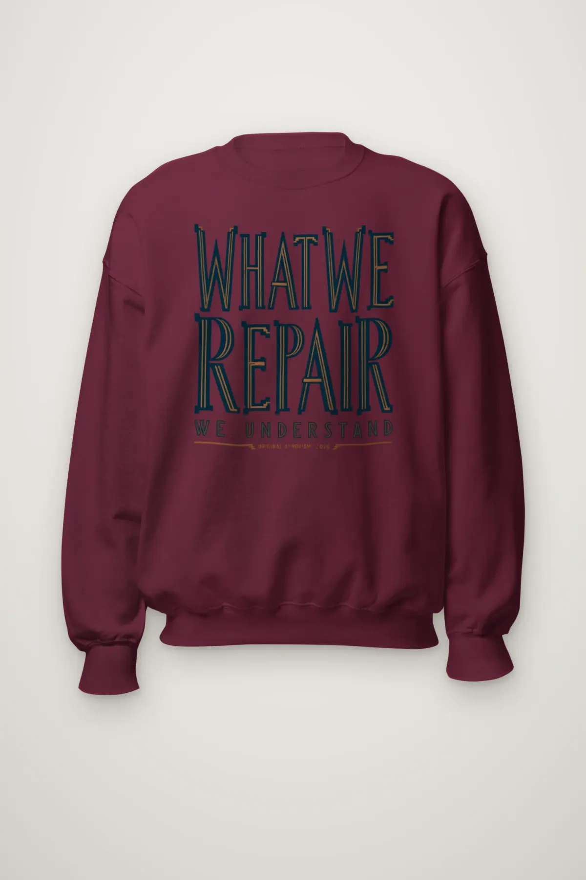 "What We Repair We Understand" Heavy Blend Unisex Crewneck Sweatshirt