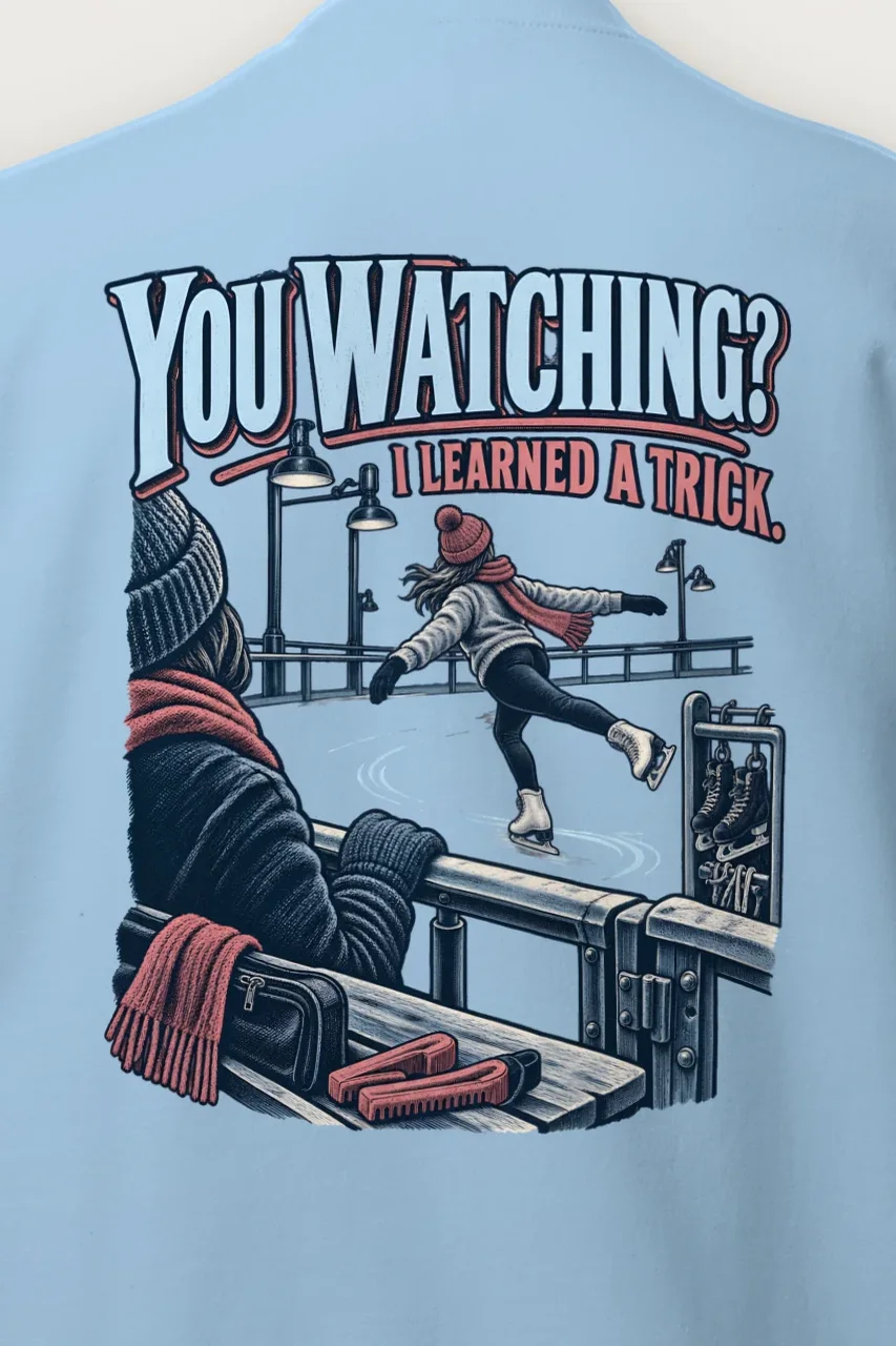 "You Watching? I Learned a Trick" Heavy Blend Unisex Crewneck Sweatshirt - the graphic up close