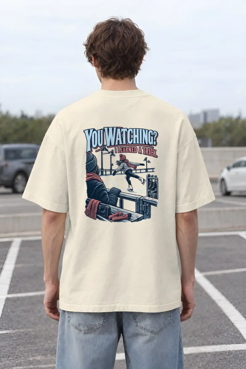 “You Watching? I Learned A Trick” Men’s Oversized Heavyweight Crewneck T-Shirt